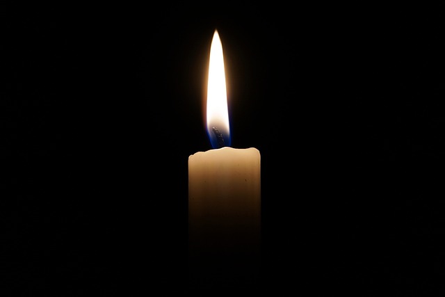 candle in darkness representing hope candle in darkness representing hope