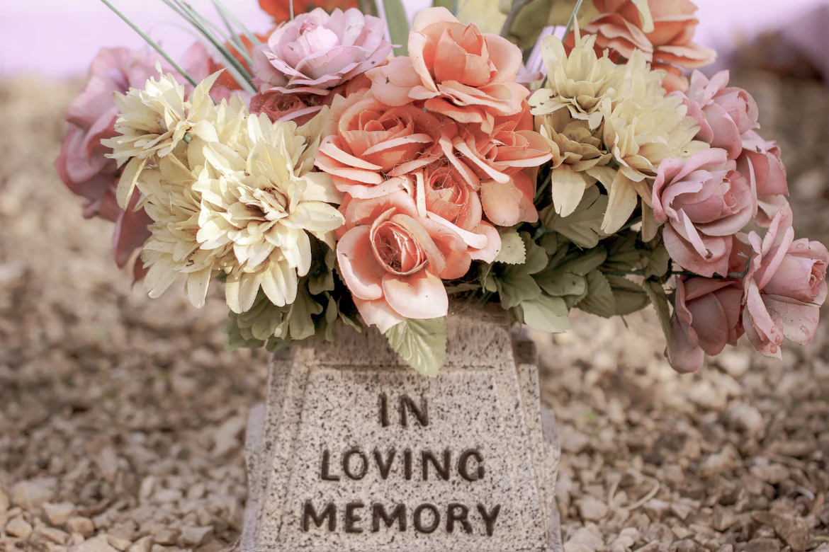 Flowers in loving memory; Photo by Sandy Millar on Unsplash Flowers in loving memory; Photo by Sandy Millar on Unsplash